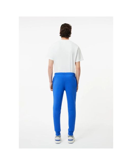 Trousers > sweatpants Lacoste pour homme en coloris Blue