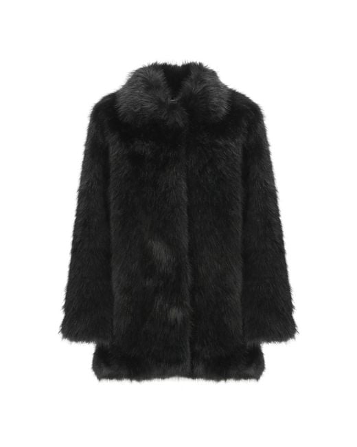 Cappotto nero in pelliccia sintetica con colletto di Betta Corradi in Black