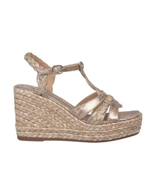 Alma En Pena. Metallic Wedges