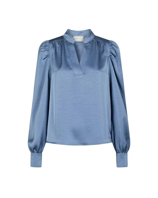 Neo Noir Blue Blouses
