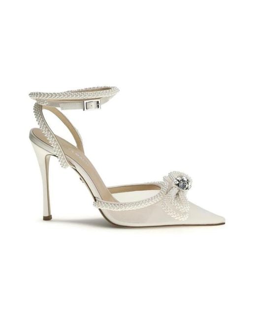 Mach & Mach White Pumps