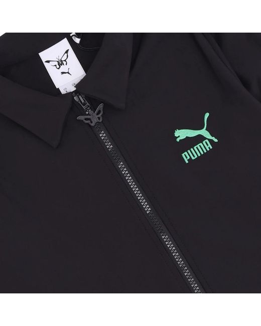 PUMA Jassen ,Zwart ,Polyester Zwarte Tracksuit Jas Met Dua Lipa in het Black