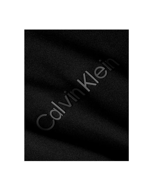 Calvin Klein Black Minimalistische Eleganz: es Damen T-Shirt aus Polyester mit Logo