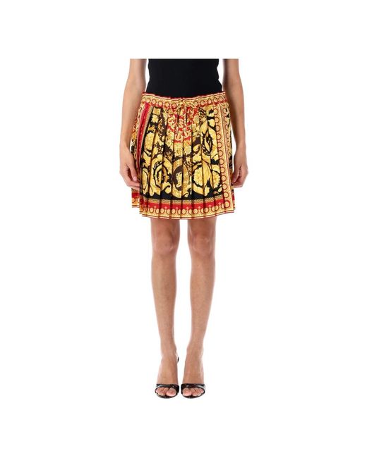 Short Skirts Versace en coloris Yellow