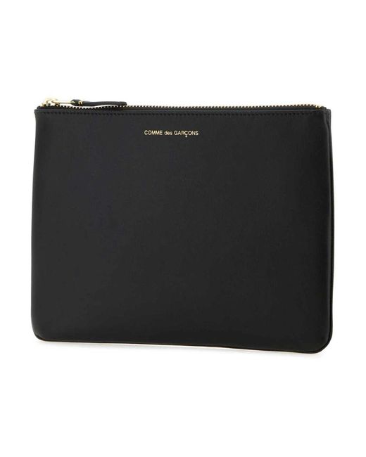 Clutches di Comme des Garçons in Black