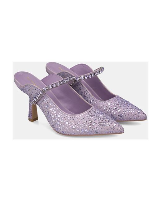 Alma En Pena. Purple Heeled Mules