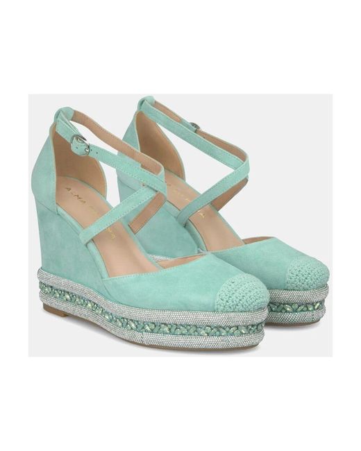 Alma En Pena. Green Rhinestone-keil-sandalette