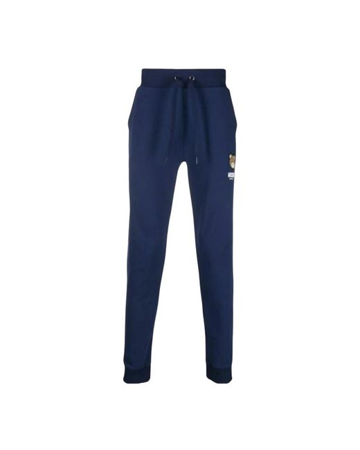 Trousers > sweatpants Moschino pour homme en coloris Blue