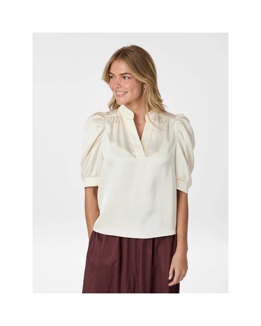 Neo Noir White Blouses
