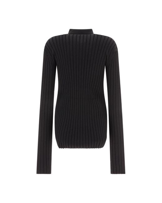 Nensi Dojaka Black Shirts