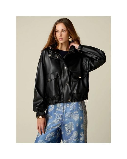 Light Jackets Oltre de color Black