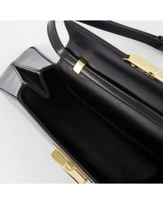 Prada Black Lederhandtasche mit verstellbarem riemen und klappverschluss