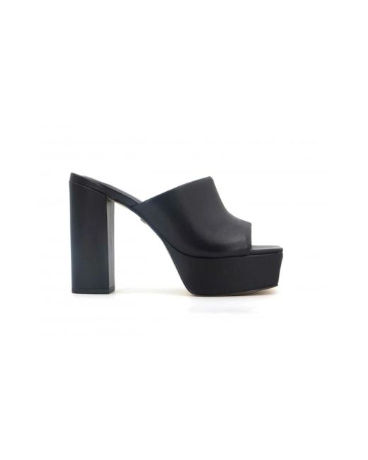 Heeled Mules di Carrano in Blue