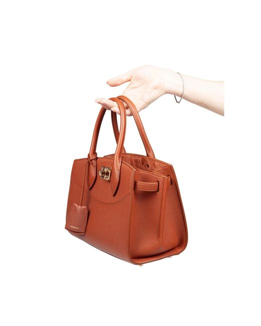 Handbags di Ferragamo in Red