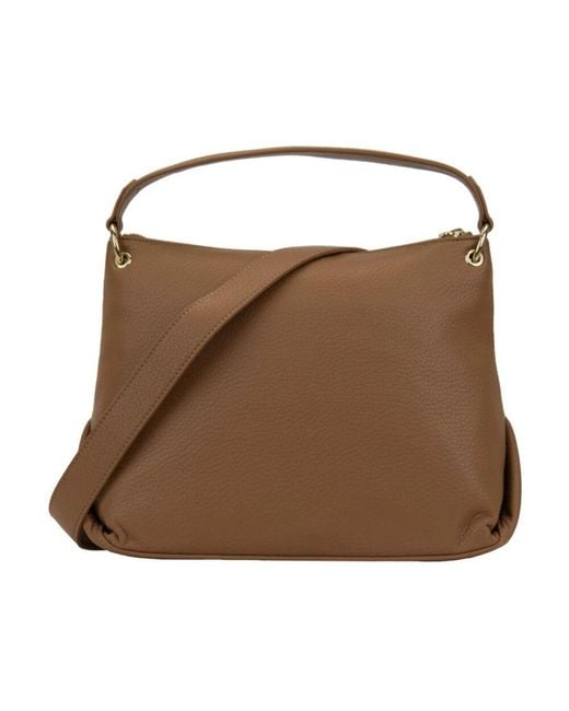 Handbags di Moschino in Brown