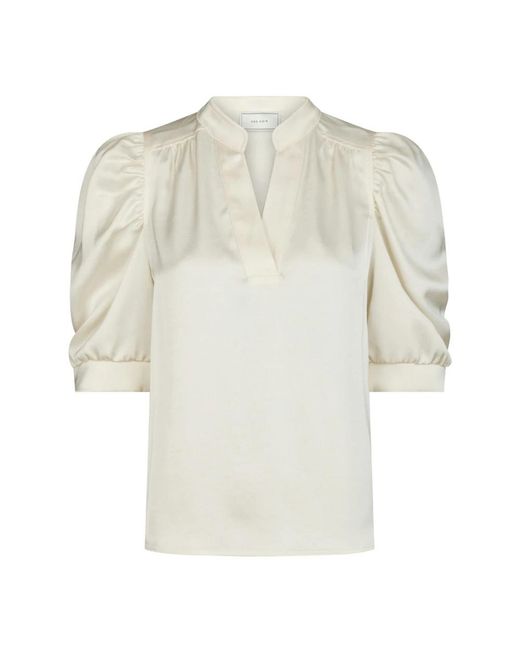 Neo Noir White Blouses