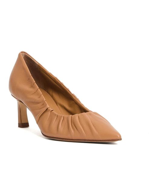 Halmanera Brown Pumps
