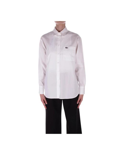 Camisa con botones y logo frontal Lacoste de color White