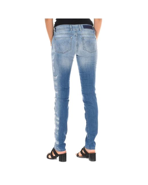 Jeans skinny Met en coloris Blue