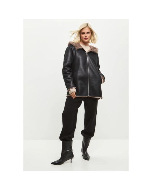 CESARE GASPARI Black Wendbare kunstlederjacke mit kunstpelzbesatz