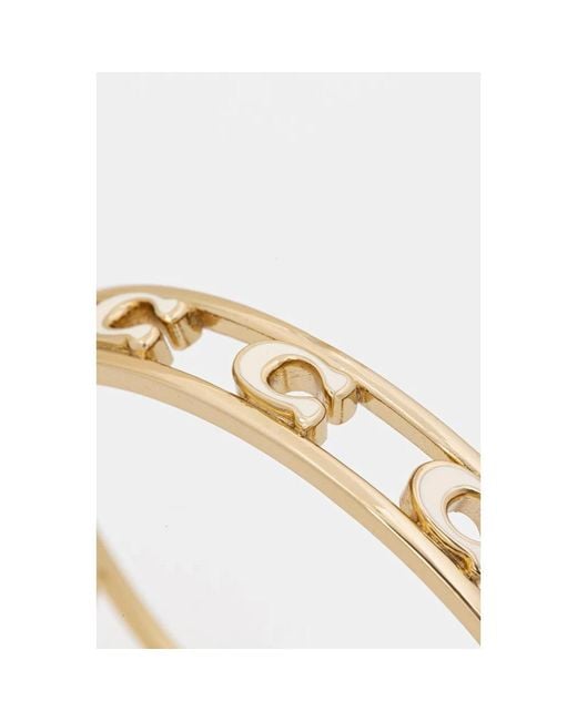 Bracelets COACH en coloris Metallic