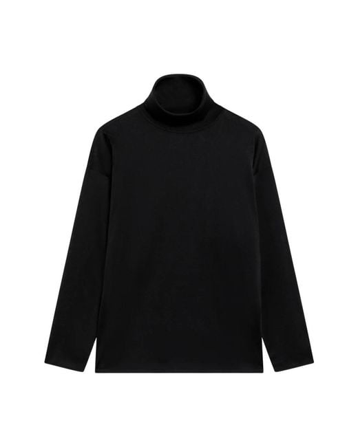 Gucci Black Turtlenecks