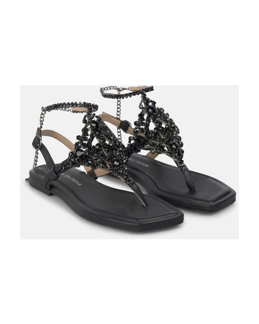 Alma En Pena. Black Flat Sandals