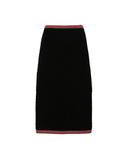 Midi skirts Gucci de color Black