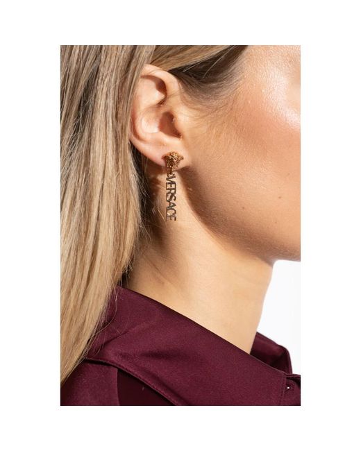 Earrings Versace de color Metallic