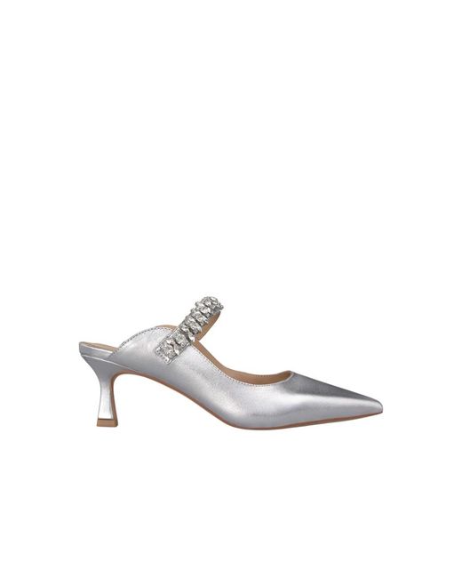 Alma En Pena. White Heeled Mules