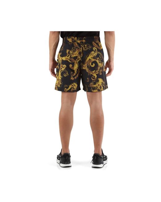 Versace Technische bermuda-shorts mit all-over-print in Black für Herren