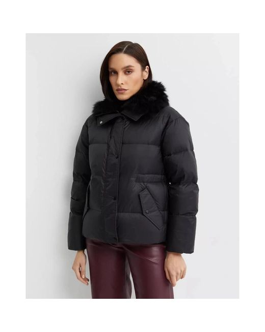 Yves Salomon Puffer Jacket Met Kraag Van Bont in het Black