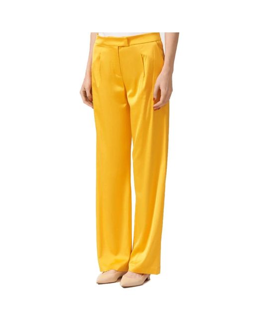 Pantalones elegantes de tela brillante Patrizia Pepe de color Yellow