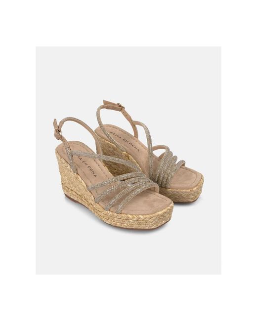 Alma En Pena. Metallic Wedges