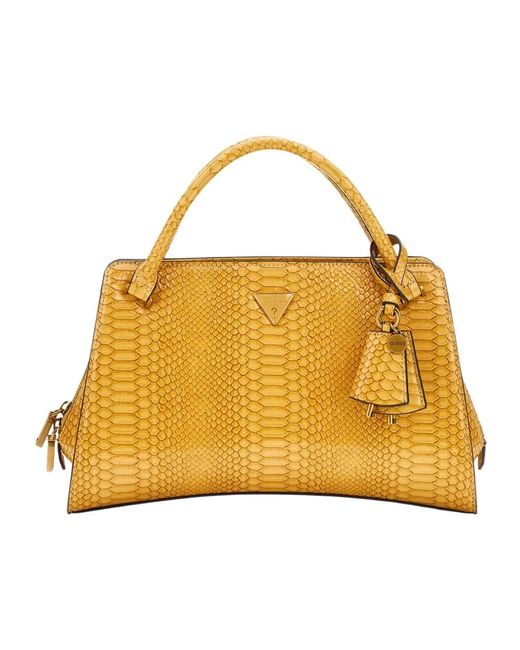 Handbags di Guess in Yellow