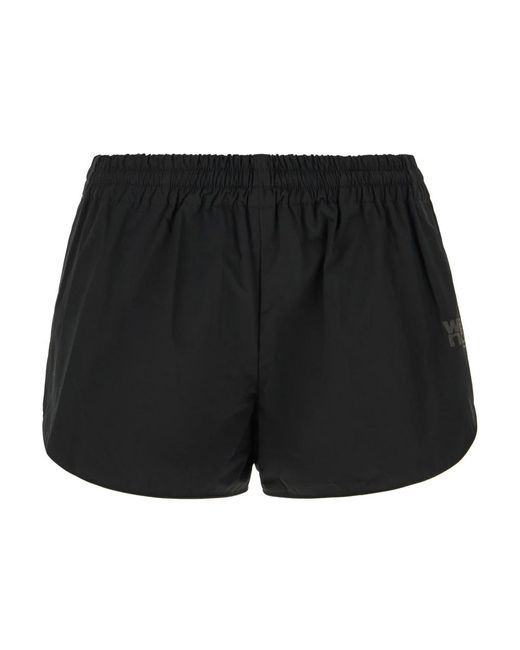 Shorts de mezclilla casuales para mujeres T By Alexander Wang de color Black