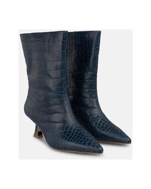 Alma En Pena. Blue Heeled Boots
