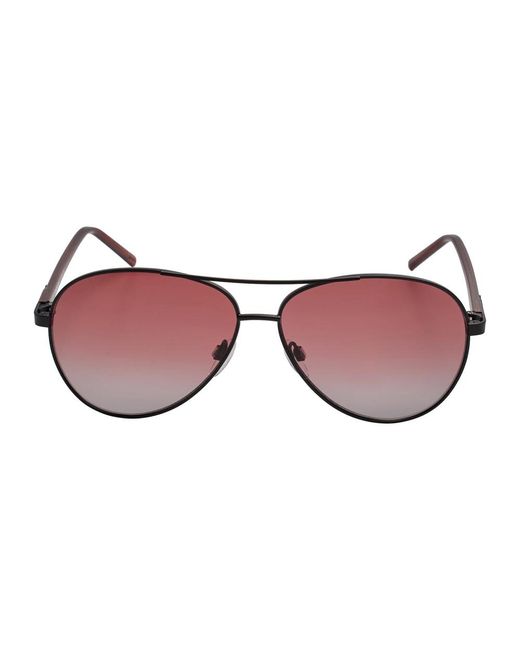 Sunglasses di DKNY in Brown