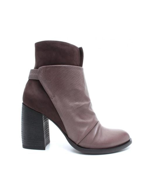 Heeled Boots Ixos en coloris Brown