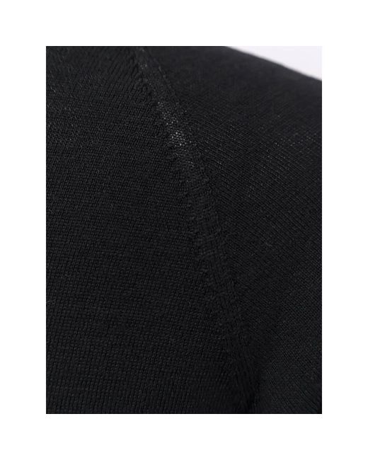 The Row Black Turtlenecks