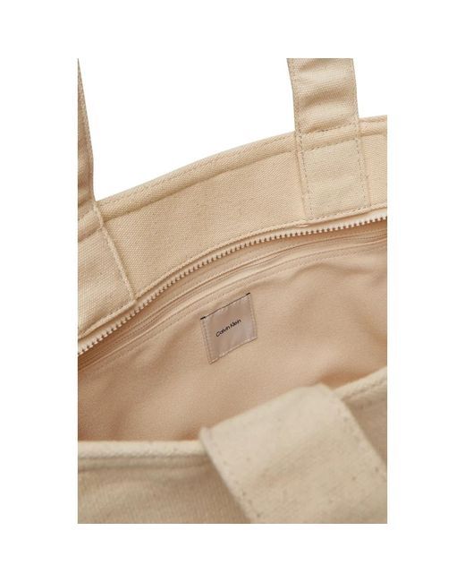 Calvin Klein Natural Handbags
