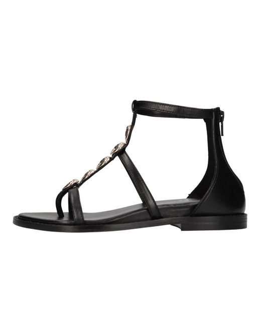 Emanuélle Vee Black Flat Sandals