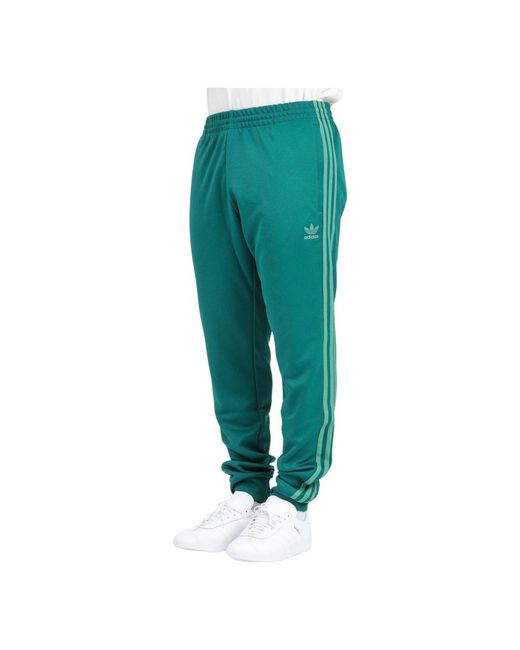 adidas Originals Grune sportliche classics sst hose in Grun fur Herren Lyst DE