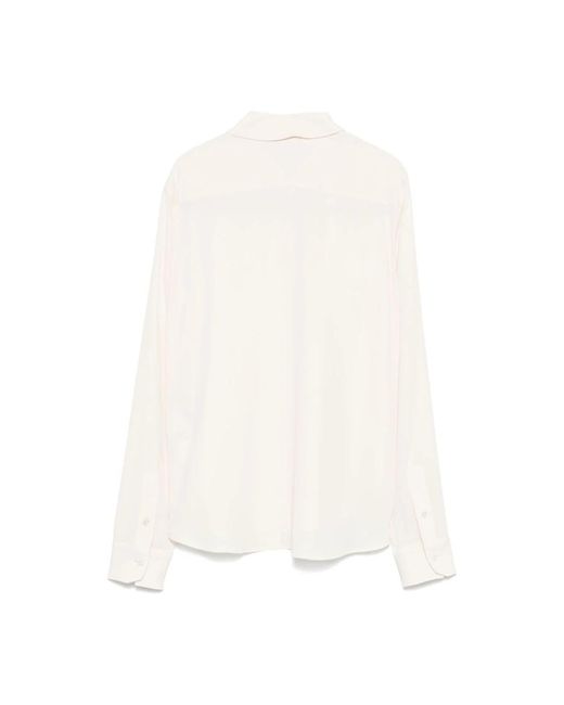 Seventy White Shirts