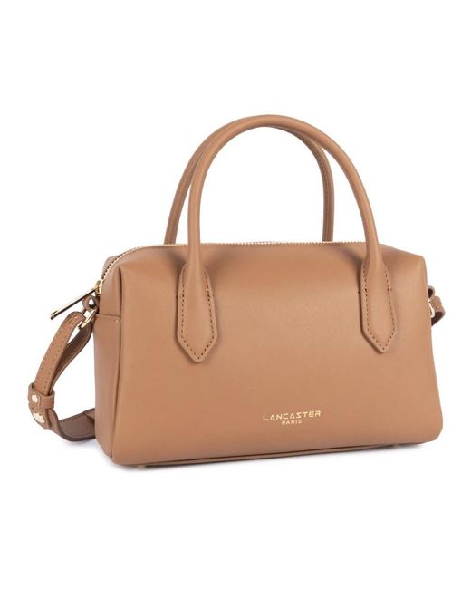 Handbags di Lancaster in Brown