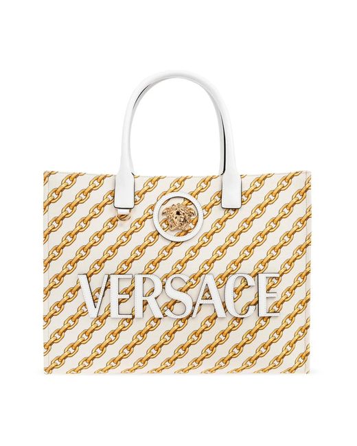 Handbags Versace de color Metallic