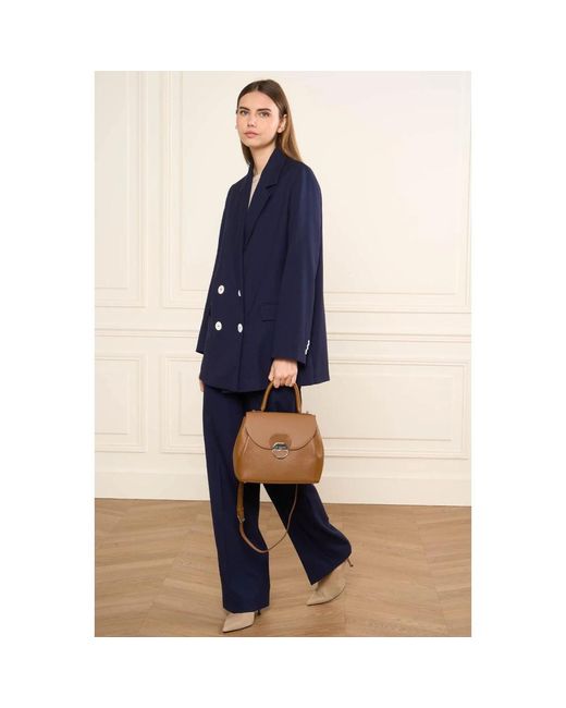 Handbags di Lancaster in Brown