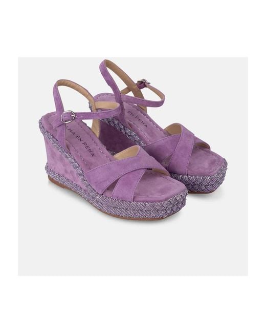 Alma En Pena. Purple Wedges
