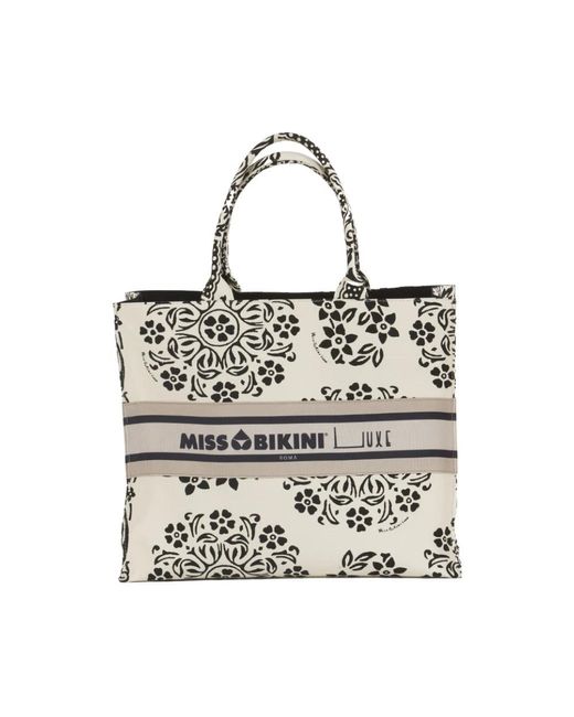 Miss Bikini Metallic Tote Bags