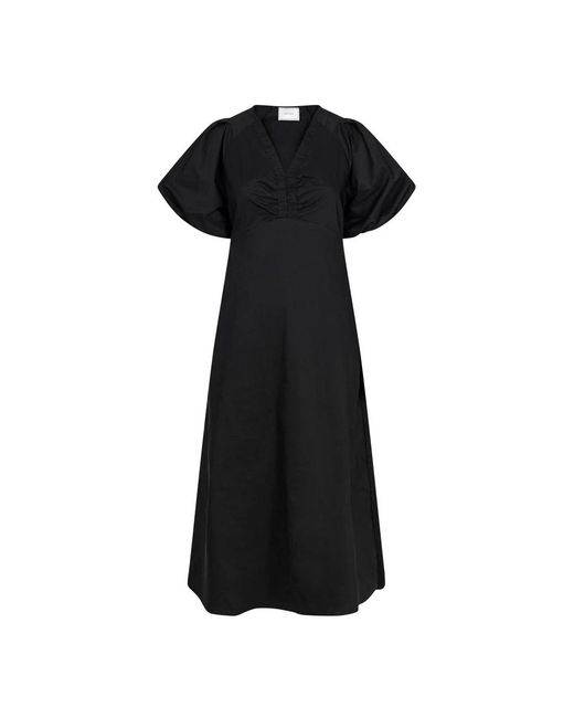 Neo Noir Black Midi Dresses